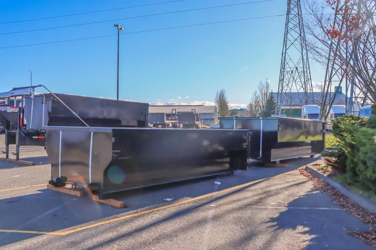 Roll-off dumpster ready for waste disposal at job site for Construction Dumpster Rental in Edison